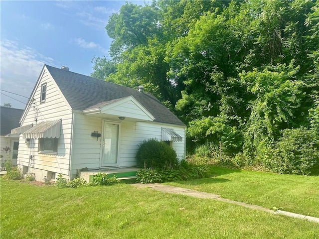 853 5th St, East Rochester, PA 15074 - bungalow with a front lawn and roof with shingles