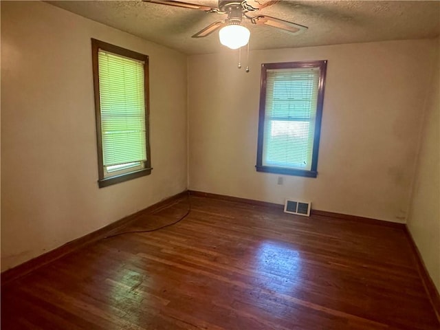 853 5th St, East Rochester, PA 15074 - unfurnished room featuring wood finished floors, a textured ceiling, and ceiling fan