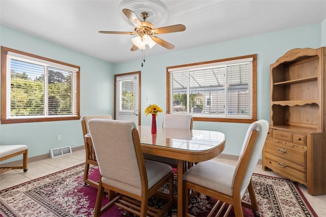 3040 Broadway Ave, Castle Shannon, PA 15234 - dining room with a ceiling fan and light tile patterned floors