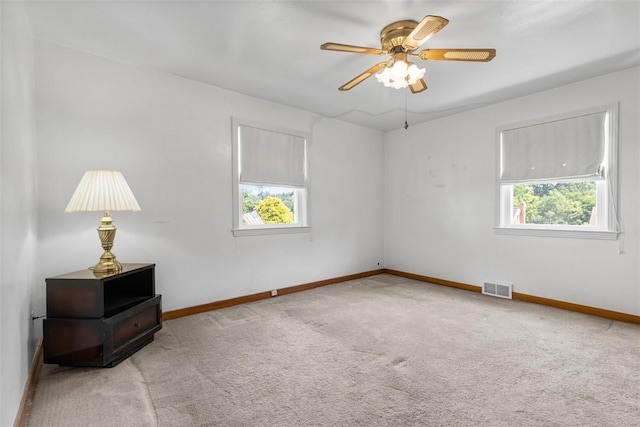 3040 Broadway Ave, Castle Shannon, PA 15234 - carpeted empty room with healthy amount of natural light and a ceiling fan