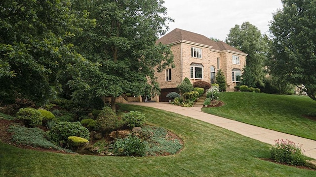 117 Cidar Ln, Peters Twp, PA 15317 - view of front of property with a front yard, an attached garage, and brick siding