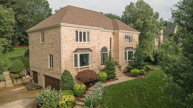 117 Cidar Ln, Peters Twp, PA 15317 - view of front of property with a garage, brick siding, a front yard, and concrete driveway