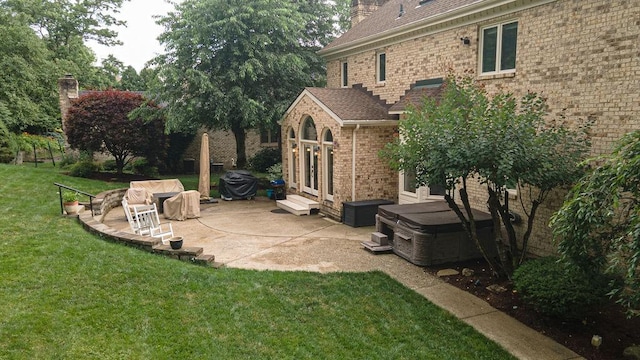 117 Cidar Ln, Peters Twp, PA 15317 - view of green lawn with a patio and a hot tub