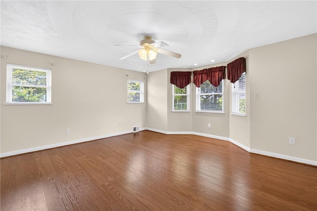 228 Mcmasters Dr, Monroeville, PA 15146 - unfurnished room featuring plenty of natural light, wood finished floors, and a ceiling fan
