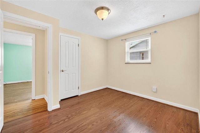 228 Mcmasters Dr, Monroeville, PA 15146 - unfurnished bedroom with wood finished floors