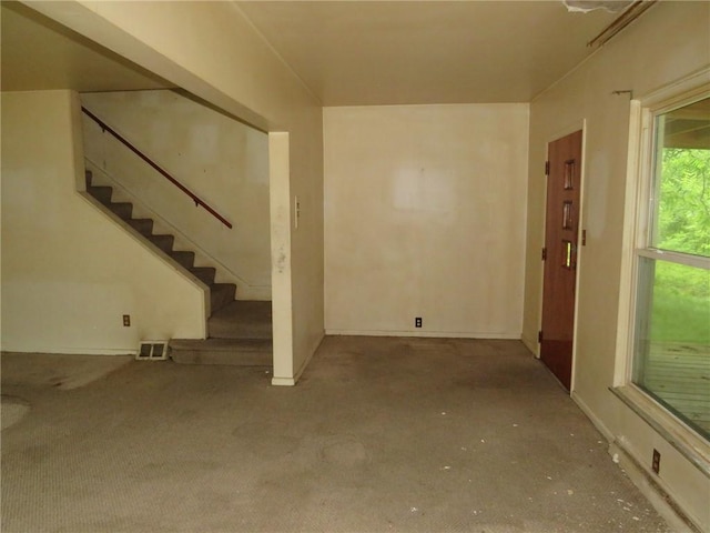 60 Wisetown Rd, Pa, PA 15022 - unfurnished living room featuring stairs and carpet flooring