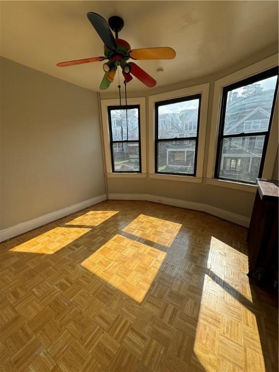 207 N Sprague Ave, Bellevue, PA 15202 - unfurnished room with a ceiling fan and baseboards