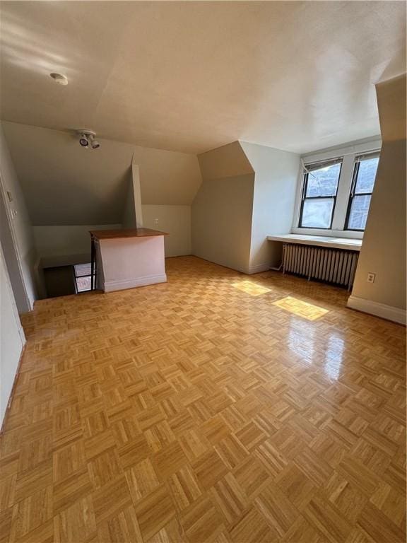 207 N Sprague Ave, Bellevue, PA 15202 - additional living space featuring radiator heating unit and vaulted ceiling