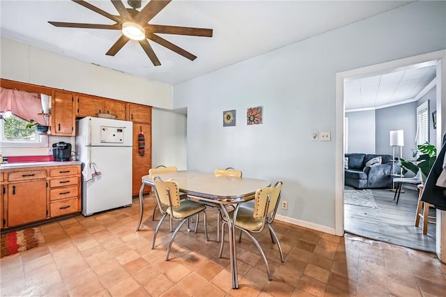61 S 10th St, Sharpsville, PA 16150 - dining room with a ceiling fan