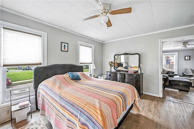 61 S 10th St, Sharpsville, PA 16150 - bedroom featuring wood finished floors, ornamental molding, and ceiling fan