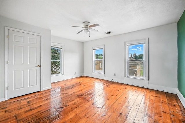 61 S 10th St, Sharpsville, PA 16150 - spare room featuring ceiling fan and hardwood / wood-style floors