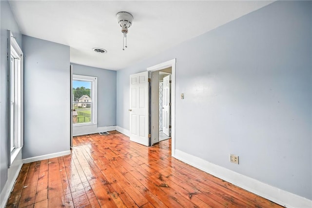 61 S 10th St, Sharpsville, PA 16150 - empty room with hardwood / wood-style flooring and baseboards
