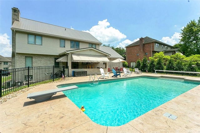 1007 Cicero Dr, Hempfield Twp, PA 15642 - view of pool with a patio area and a diving board
