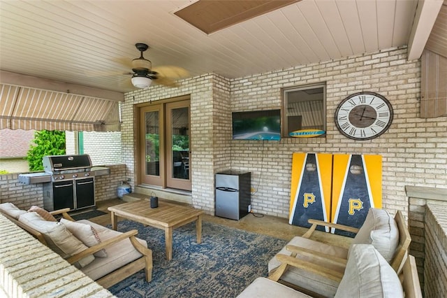 1007 Cicero Dr, Hempfield Twp, PA 15642 - living area featuring brick wall and a ceiling fan