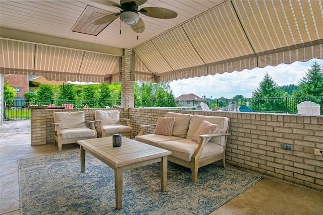 1007 Cicero Dr, Hempfield Twp, PA 15642 - fenced backyard with a patio area, a ceiling fan, and an outdoor living space