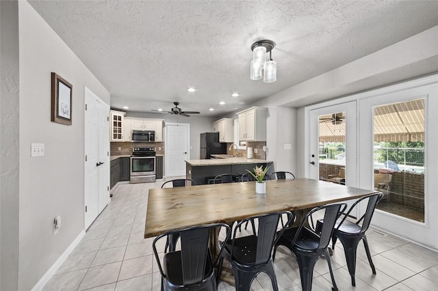 1007 Cicero Dr, Hempfield Twp, PA 15642 - dining space with a ceiling fan, light tile patterned flooring, a textured ceiling, and recessed lighting