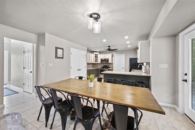 1007 Cicero Dr, Hempfield Twp, PA 15642 - dining space featuring light tile patterned floors, a ceiling fan, recessed lighting, and a textured ceiling