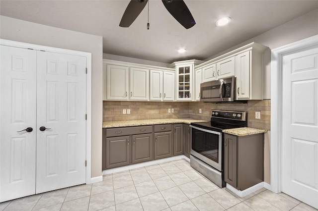 1007 Cicero Dr, Hempfield Twp, PA 15642 - kitchen with appliances with stainless steel finishes, gray cabinets, a ceiling fan, tasteful backsplash, and recessed lighting