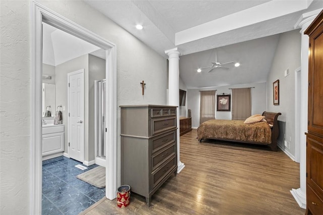 1007 Cicero Dr, Hempfield Twp, PA 15642 - bedroom featuring lofted ceiling, dark wood-style floors, recessed lighting, ornate columns, and ensuite bath