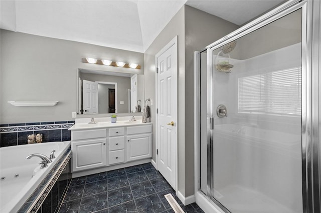 1007 Cicero Dr, Hempfield Twp, PA 15642 - bathroom featuring double vanity, a tub with jets, and a shower stall