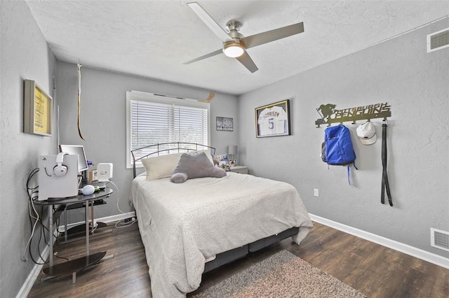 1007 Cicero Dr, Hempfield Twp, PA 15642 - bedroom featuring wood finished floors, a textured wall, a ceiling fan, and a textured ceiling