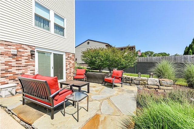 209 Farmbrook Dr, Hempfield Twp, PA 15601 - fenced backyard with a patio area