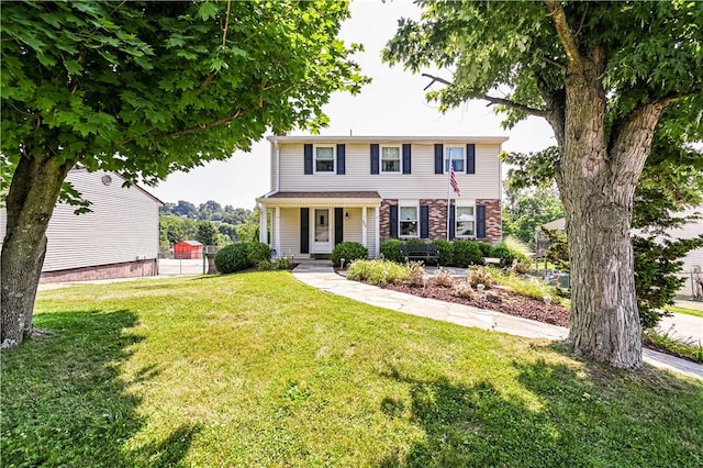 209 Farmbrook Dr, Hempfield Twp, PA 15601 - view of front of property featuring a front lawn and brick siding