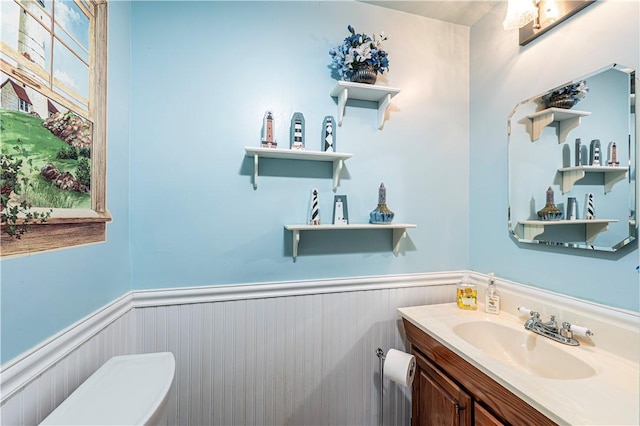 209 Farmbrook Dr, Hempfield Twp, PA 15601 - half bathroom with a wainscoted wall and vanity