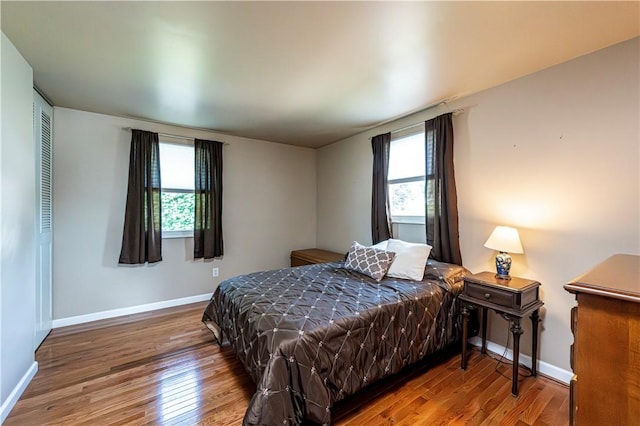 209 Farmbrook Dr, Hempfield Twp, PA 15601 - bedroom featuring wood finished floors and baseboards