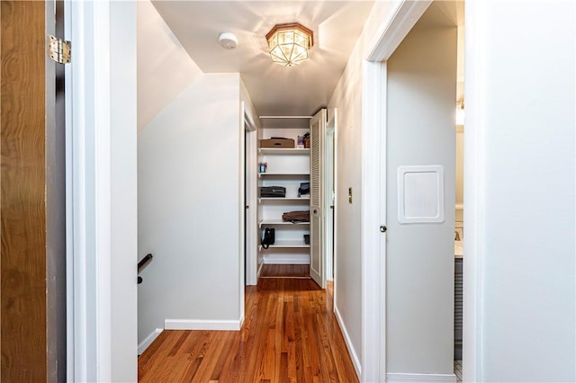 209 Farmbrook Dr, Hempfield Twp, PA 15601 - hall featuring wood finished floors and an upstairs landing