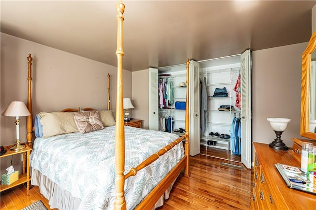 209 Farmbrook Dr, Hempfield Twp, PA 15601 - bedroom featuring wood finished floors and two closets
