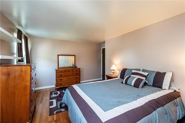 209 Farmbrook Dr, Hempfield Twp, PA 15601 - bedroom featuring wood finished floors and baseboards