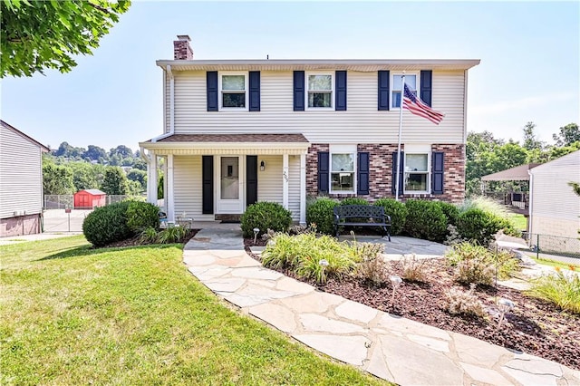 209 Farmbrook Dr, Hempfield Twp, PA 15601 - view of front of home featuring a chimney and a porch