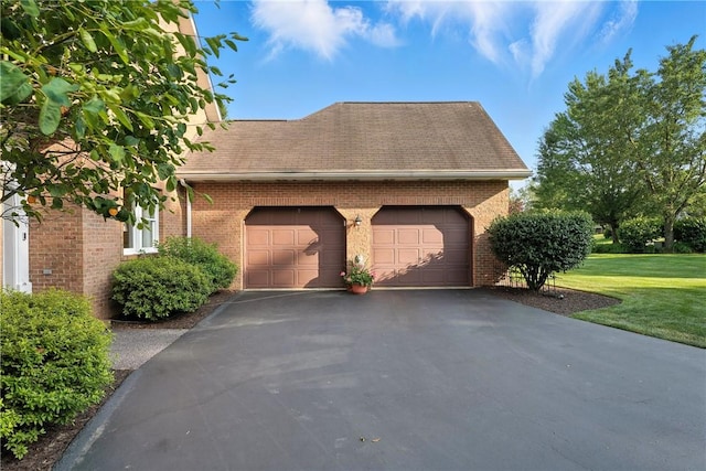 13 Kings Ln, Pine Twp, PA 16127 - view of home's exterior featuring brick siding, asphalt driveway, a lawn, and a garage