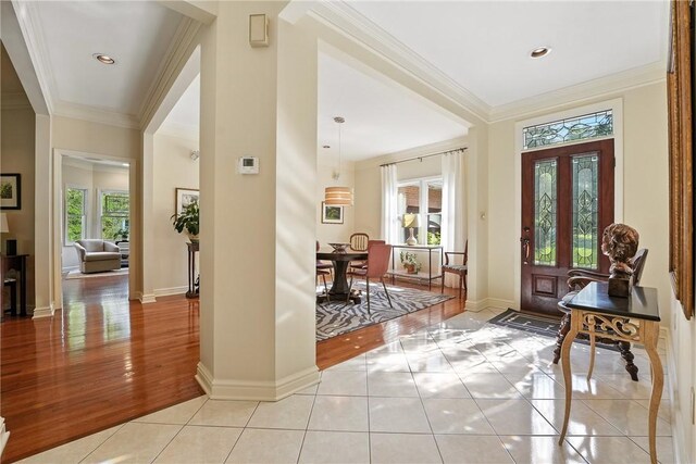 13 Kings Ln, Pine Twp, PA 16127 - entryway with light tile patterned flooring and ornamental molding