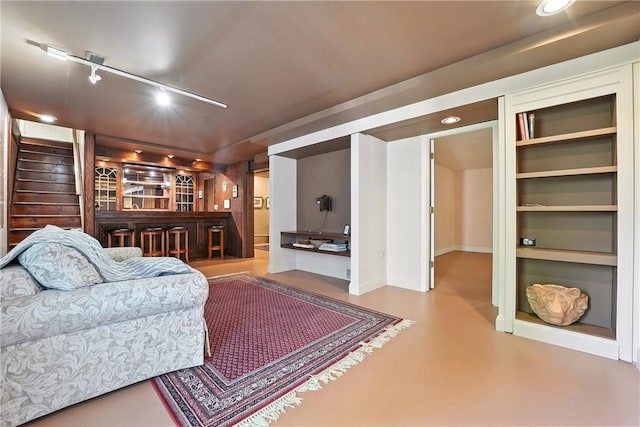 13 Kings Ln, Pine Twp, PA 16127 - living area featuring concrete floors and rail lighting