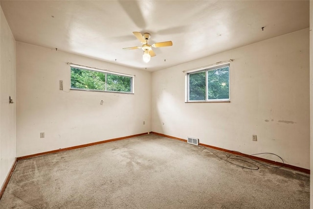 2158 Reis Run Rd, Franklin Park, PA 15237 - empty room featuring plenty of natural light, carpet floors, and ceiling fan