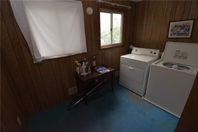 1323 Leaside Dr, Lincoln Place, PA 15207 - laundry room with washer and clothes dryer, wooden walls, and carpet floors