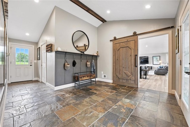 251 Myers Ln, Indiana Twp, PA 15101 - foyer with stone tile floors, a barn door, beamed ceiling, recessed lighting, and high vaulted ceiling