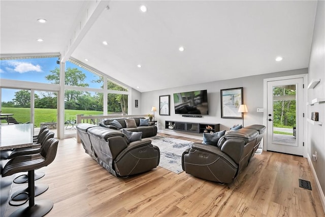 251 Myers Ln, Indiana Twp, PA 15101 - living area with beamed ceiling, light wood-style floors, and high vaulted ceiling