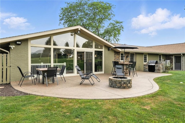 251 Myers Ln, Indiana Twp, PA 15101 - back of house with an outdoor kitchen, a fire pit, a patio area, and a lawn