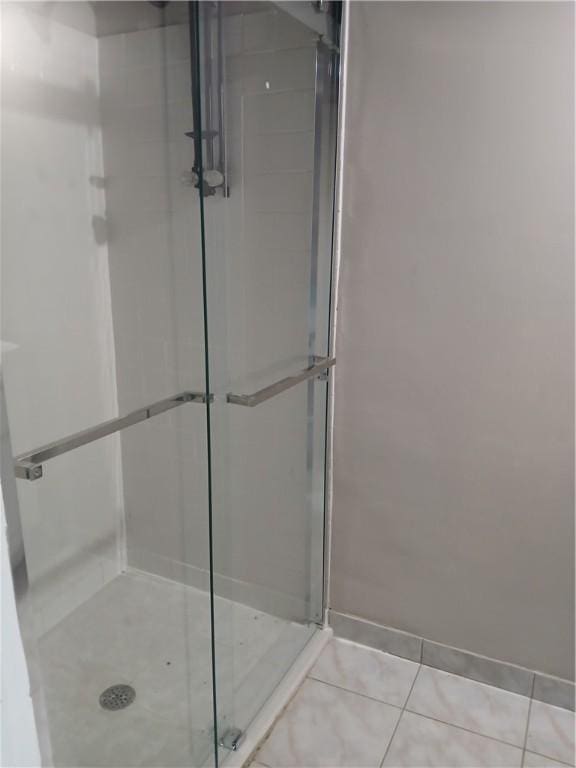 1211 Reed St, North Huntingdon, PA 15642 - bathroom featuring a stall shower and tile patterned floors