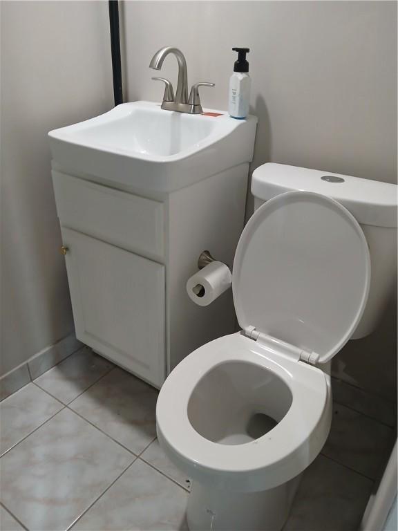 1211 Reed St, North Huntingdon, PA 15642 - bathroom featuring tile patterned flooring and vanity