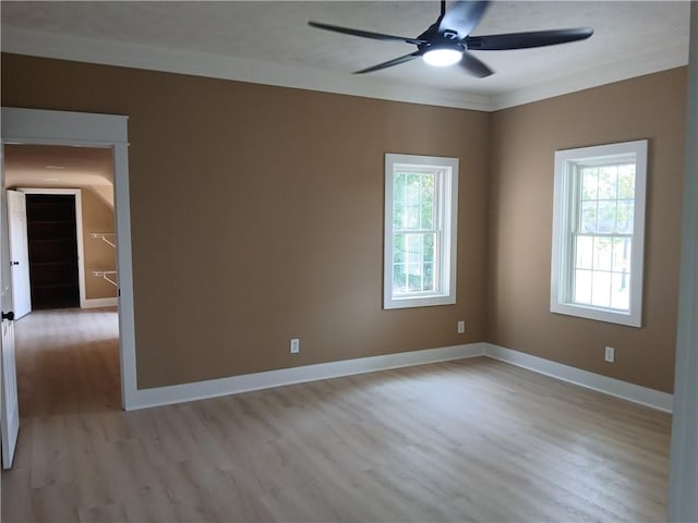 1211 Reed St, North Huntingdon, PA 15642 - empty room with light wood finished floors and a ceiling fan