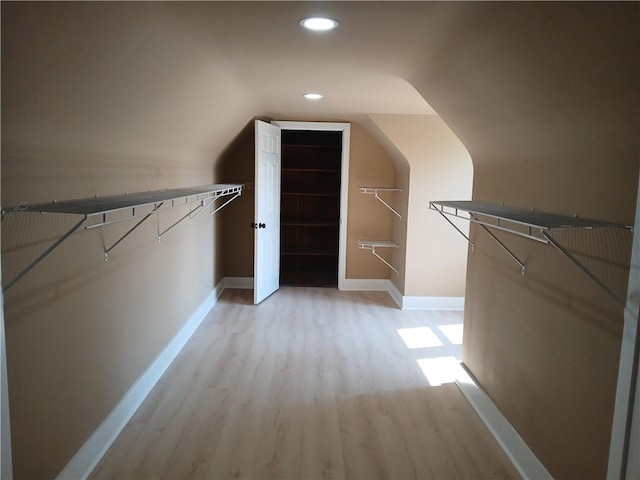 1211 Reed St, North Huntingdon, PA 15642 - walk in closet featuring light wood-type flooring and vaulted ceiling