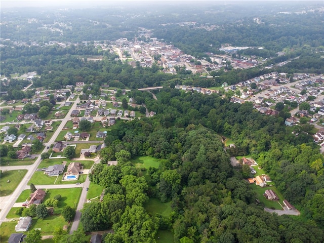 1211 Reed St, North Huntingdon, PA 15642 - aerial view of property and surrounding area with a forest and nearby suburban area
