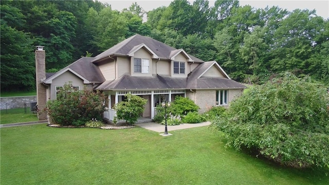293 Sandy Hill Rd, Middlesex Twp, PA 16059 - view of front facade featuring a front lawn and brick siding