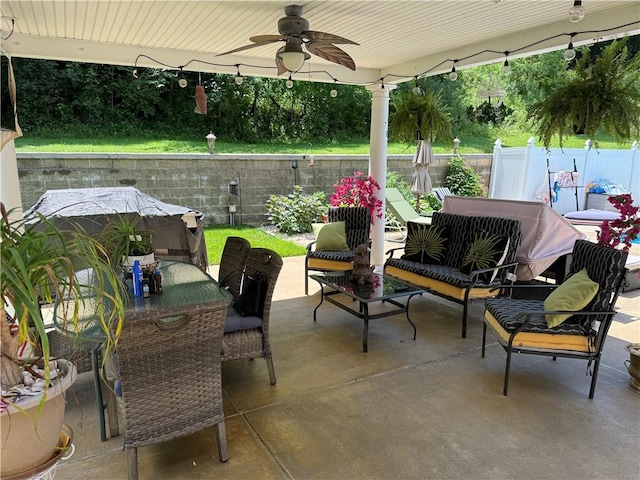 293 Sandy Hill Rd, Middlesex Twp, PA 16059 - fenced backyard with ceiling fan and a patio area