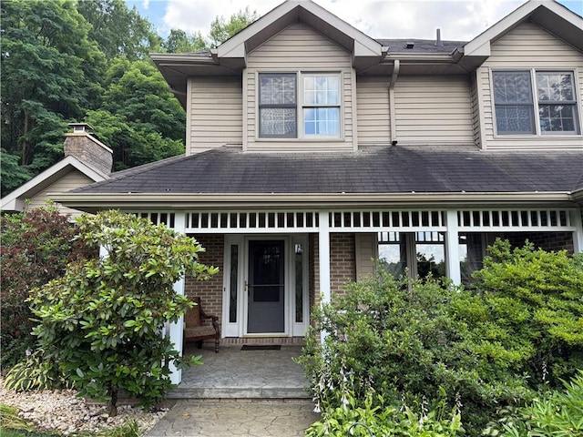 293 Sandy Hill Rd, Middlesex Twp, PA 16059 - view of front of house with covered porch and brick siding