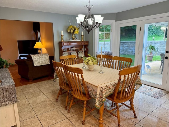 293 Sandy Hill Rd, Middlesex Twp, PA 16059 - dining room featuring a chandelier and light tile patterned flooring